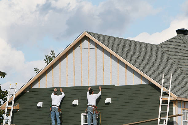 Professional Siding technician working in Romeoville, IL